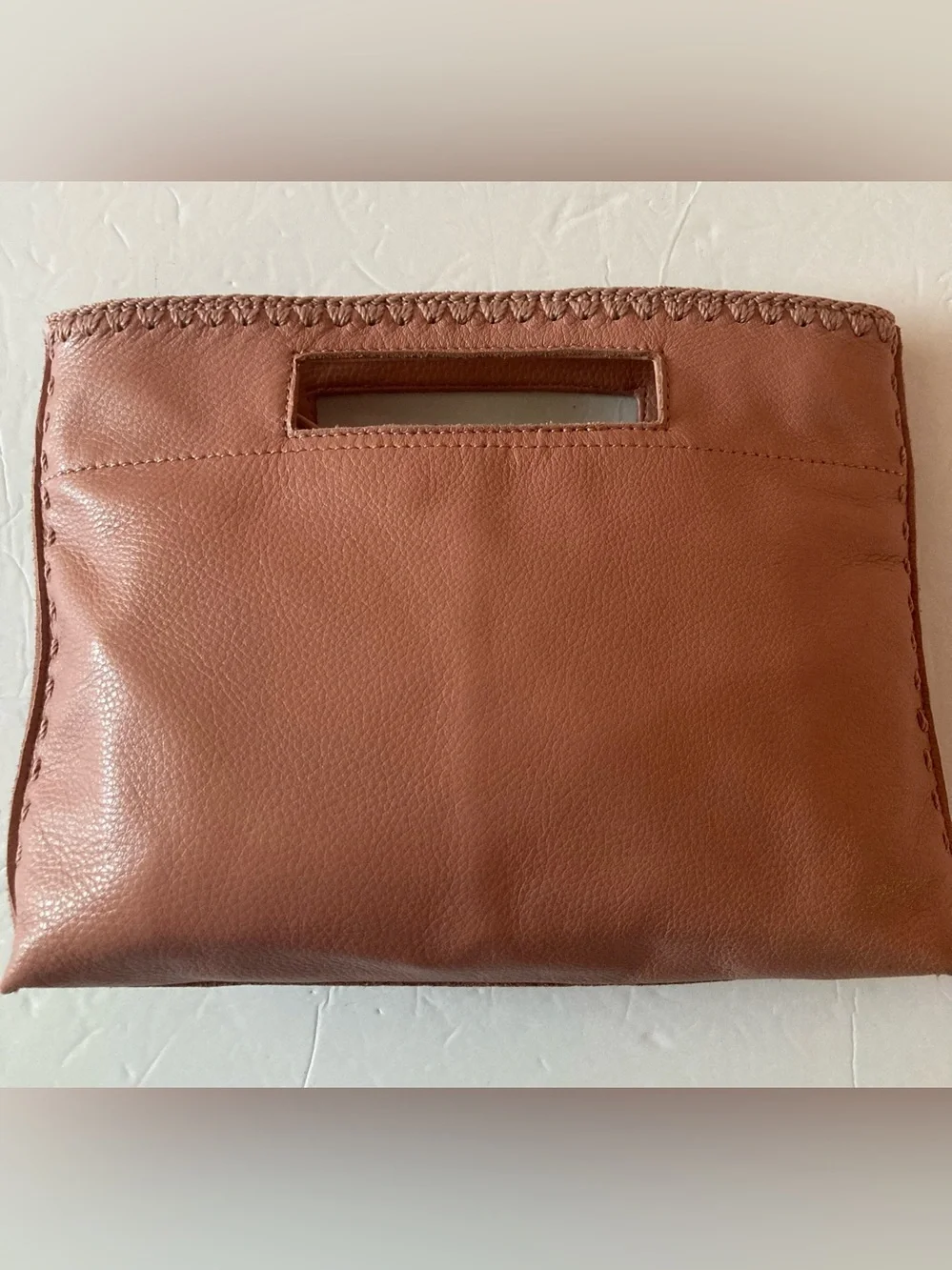 The Sak coral lite pink Leather Cutout-Handle Crossbody Clutch Hand Stitched